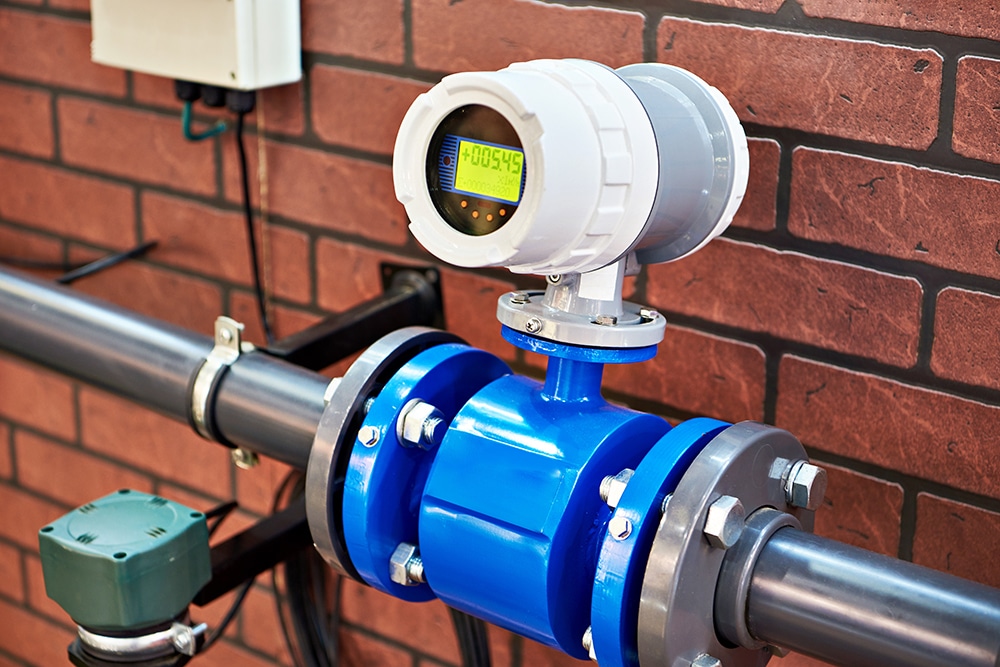 device placed on top of a module within a plumbing system that acts as a meter to measure various things